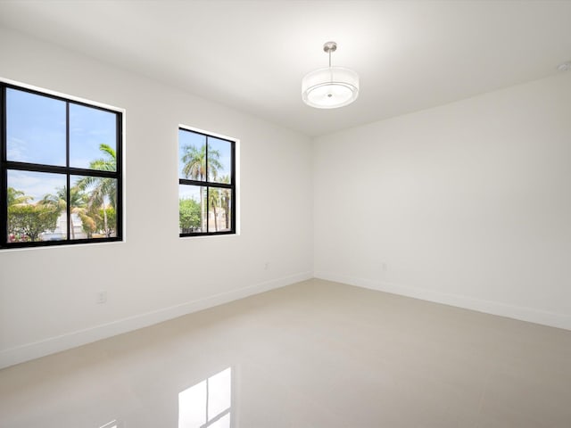 empty room with baseboards
