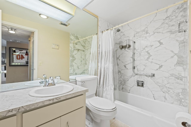 full bath featuring vanity, toilet, visible vents, and shower / bath combo with shower curtain