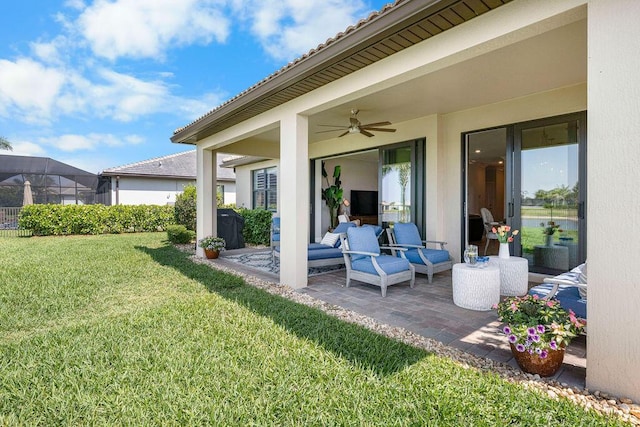 exterior space with ceiling fan