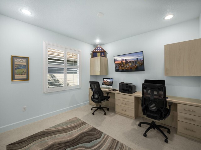 office area featuring recessed lighting and baseboards