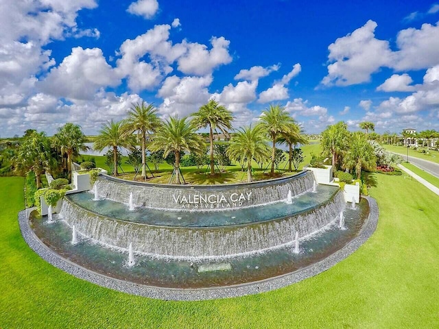 surrounding community with a lawn
