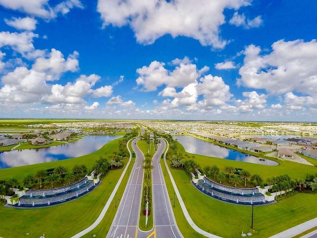 aerial view with a water view and a residential view