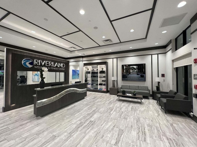 building lobby featuring visible vents