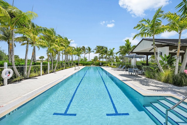 community pool featuring a patio area