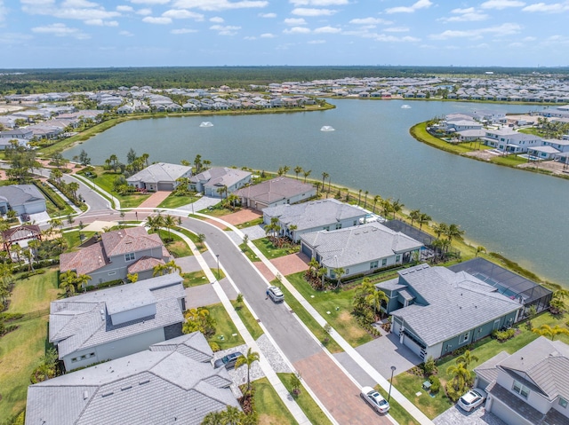 aerial view featuring a water view and a residential view