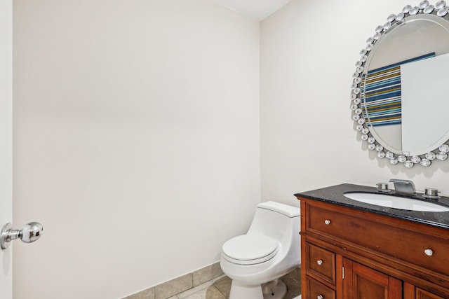 5748 Fox Hollow Dr Unit D, Boca Raton, FL 33486 - half bathroom with vanity, tile patterned flooring, baseboards, and toilet