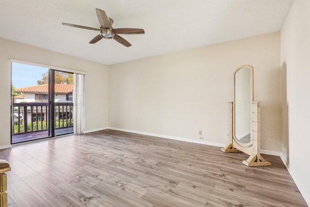 5748 Fox Hollow Dr Unit D, Boca Raton, FL 33486 - empty room featuring baseboards, ceiling fan, and wood finished floors