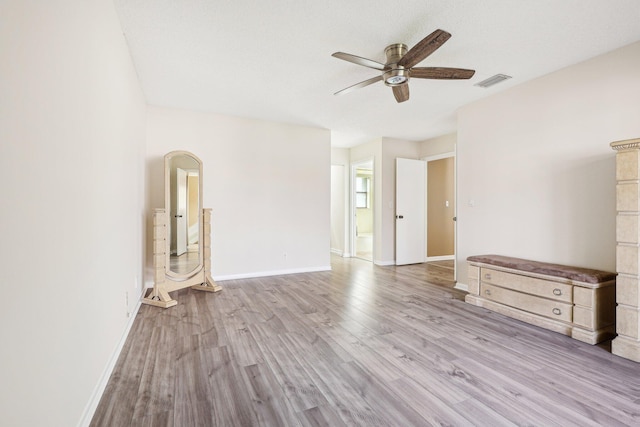 5748 Fox Hollow Dr Unit D, Boca Raton, FL 33486 - spare room with a ceiling fan, baseboards, visible vents, and wood finished floors