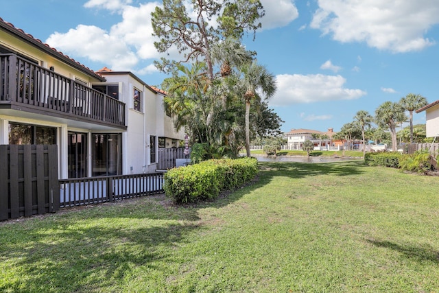 5748 Fox Hollow Dr Unit D, Boca Raton, FL 33486 - view of yard featuring fence and a balcony