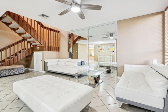 5748 Fox Hollow Dr Unit D, Boca Raton, FL 33486 - living area with stairs, a ceiling fan, visible vents, and light tile patterned floors