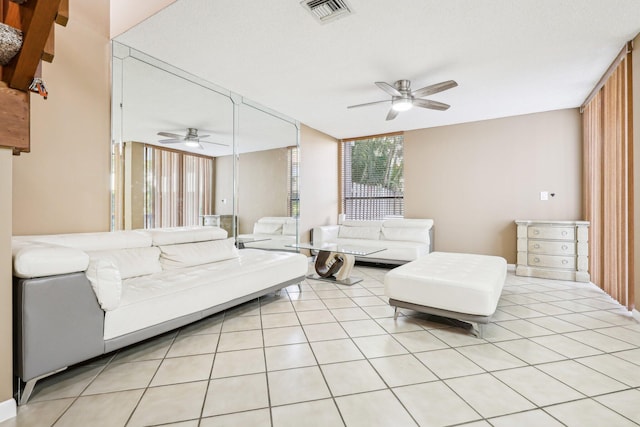 5748 Fox Hollow Dr Unit D, Boca Raton, FL 33486 - living area with light tile patterned flooring, ceiling fan, and visible vents