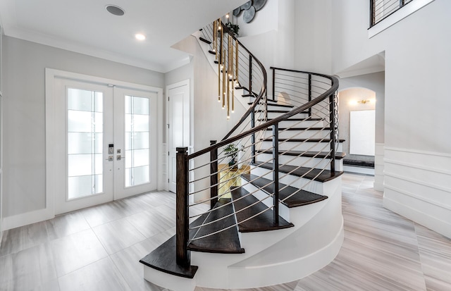 20136 Se Bridgewater Drive Livingston Model, Jupiter, FL 33458 - tiled foyer entrance featuring stairway, arched walkways, ornamental molding, and french doors