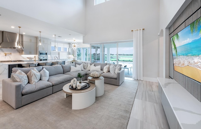 20136 Se Bridgewater Drive Livingston Model, Jupiter, FL 33458 - living room with a high ceiling and recessed lighting