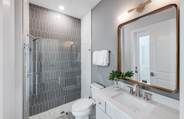 20136 Se Bridgewater Drive Livingston Model, Jupiter, FL 33458 - bathroom featuring vanity, recessed lighting, a tile shower, and toilet