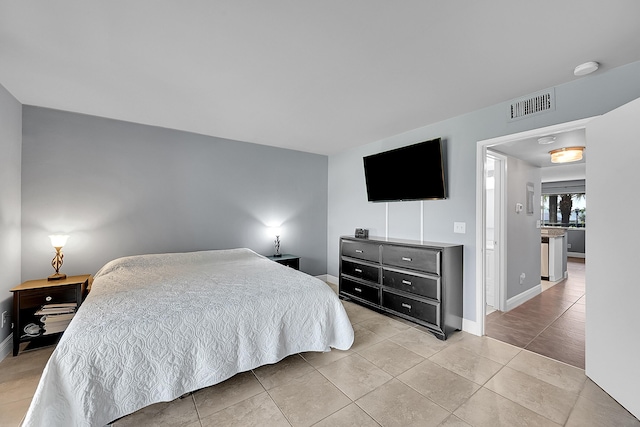 1625 Meadows Cir W, Boynton Beach, FL 33436 - bedroom with baseboards and light tile patterned flooring