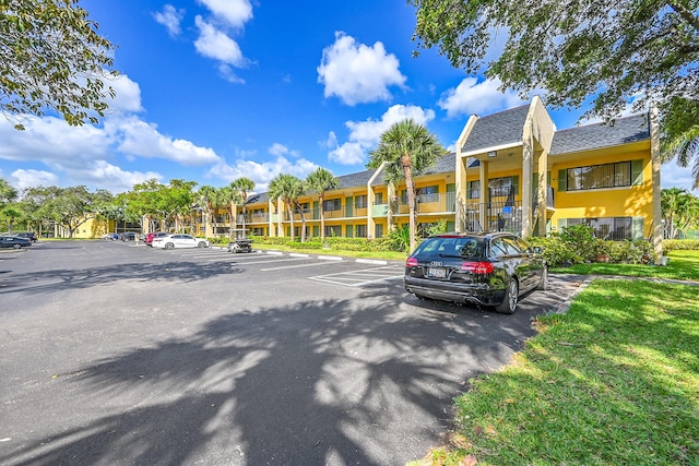 1625 Meadows Cir W, Boynton Beach, FL 33436 - view of uncovered parking lot