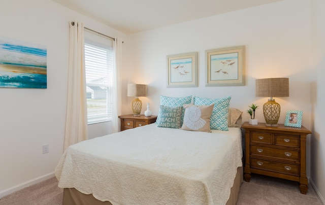 12134 SW Rimini Way, Port Saint Lucie, FL 34987 - bedroom with baseboards and light carpet