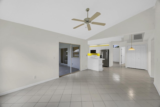 unfurnished living room featuring light tile patterned floors, high vaulted ceiling, ceiling fan, and baseboards