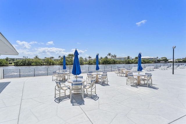 2520 S Federal Hwy Unit 14, Boynton Beach, FL 33435 - view of patio featuring fence and outdoor dining space