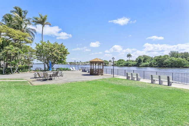 2520 S Federal Hwy Unit 14, Boynton Beach, FL 33435 - view of yard with a water view, a gazebo, and fence