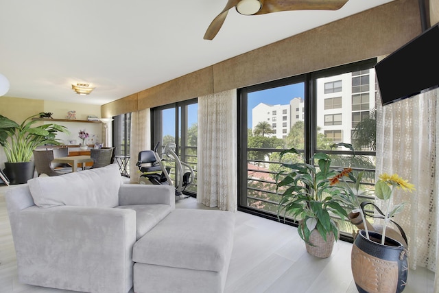living room featuring ceiling fan