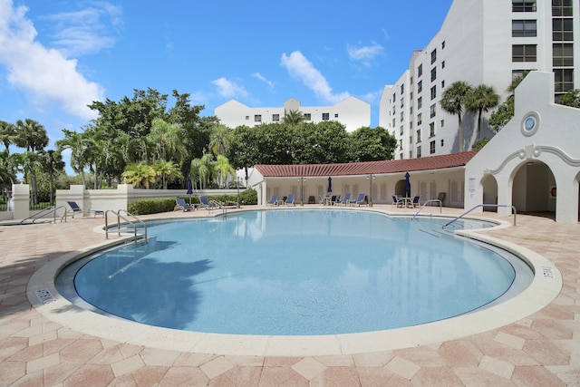 pool with a patio area