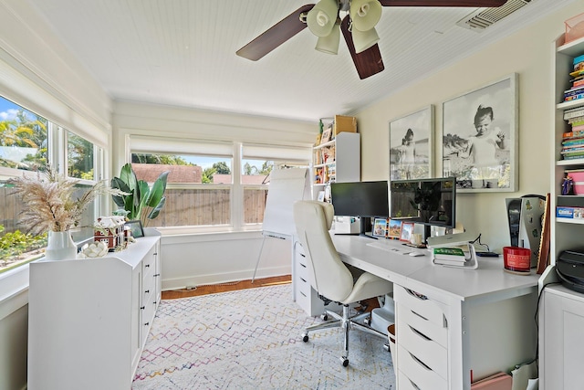 home office with ceiling fan and visible vents