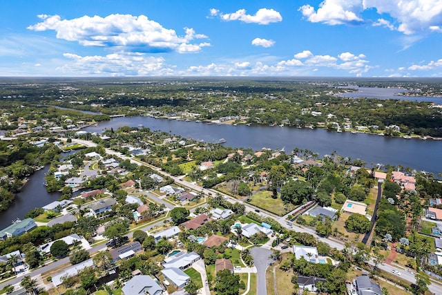 aerial view with a water view and a residential view