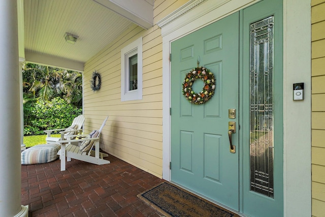 property entrance with a porch