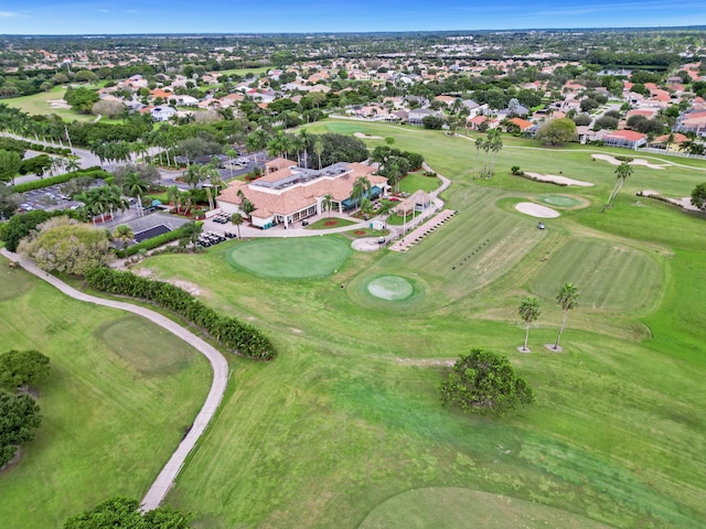 drone / aerial view featuring a residential view and golf course view
