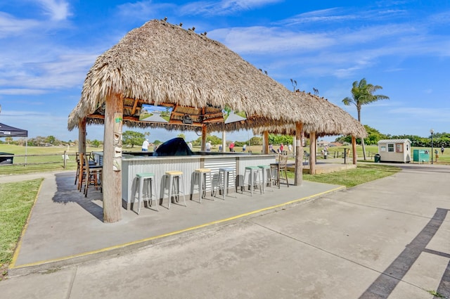 view of home's community with outdoor dry bar and a gazebo