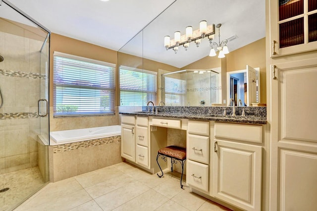 bathroom with tile patterned flooring, double vanity, a bath, a shower stall, and a sink