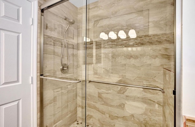 full bathroom featuring a stall shower