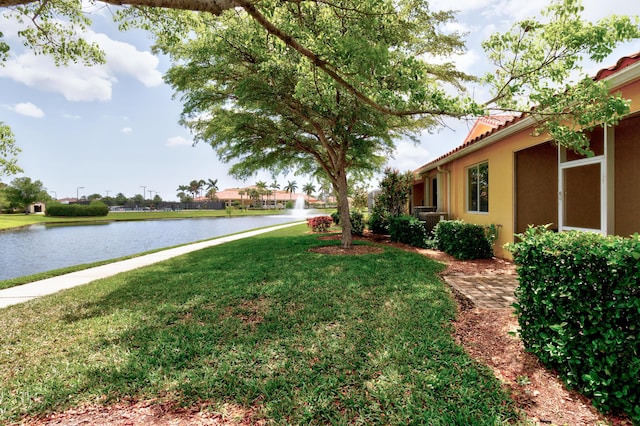 view of yard with a water view