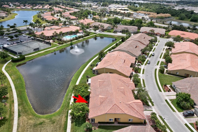 aerial view featuring a water view and a residential view