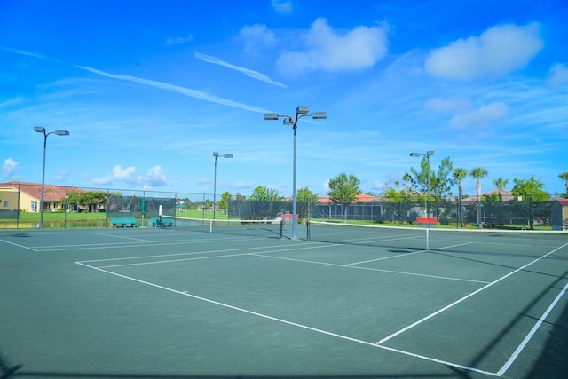view of sport court with fence and community basketball court
