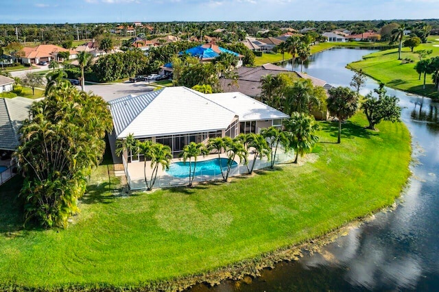 aerial view featuring a residential view and a water view