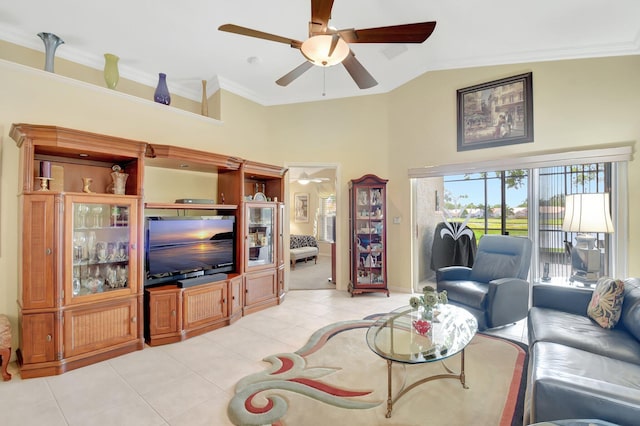 living area with ceiling fan, light tile patterned flooring, ornamental molding, and high vaulted ceiling