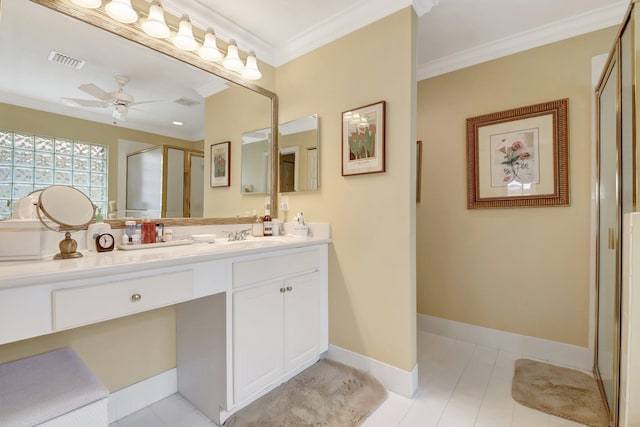 bathroom featuring ornamental molding, a shower stall, vanity, ceiling fan, and tile patterned flooring