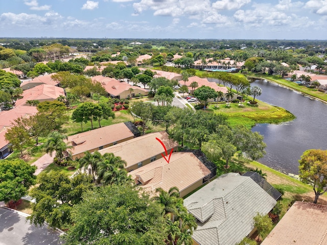 aerial view of residential area with a nearby body of water