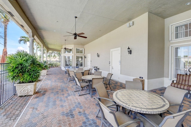 view of patio / terrace featuring outdoor dining space and ceiling fan
