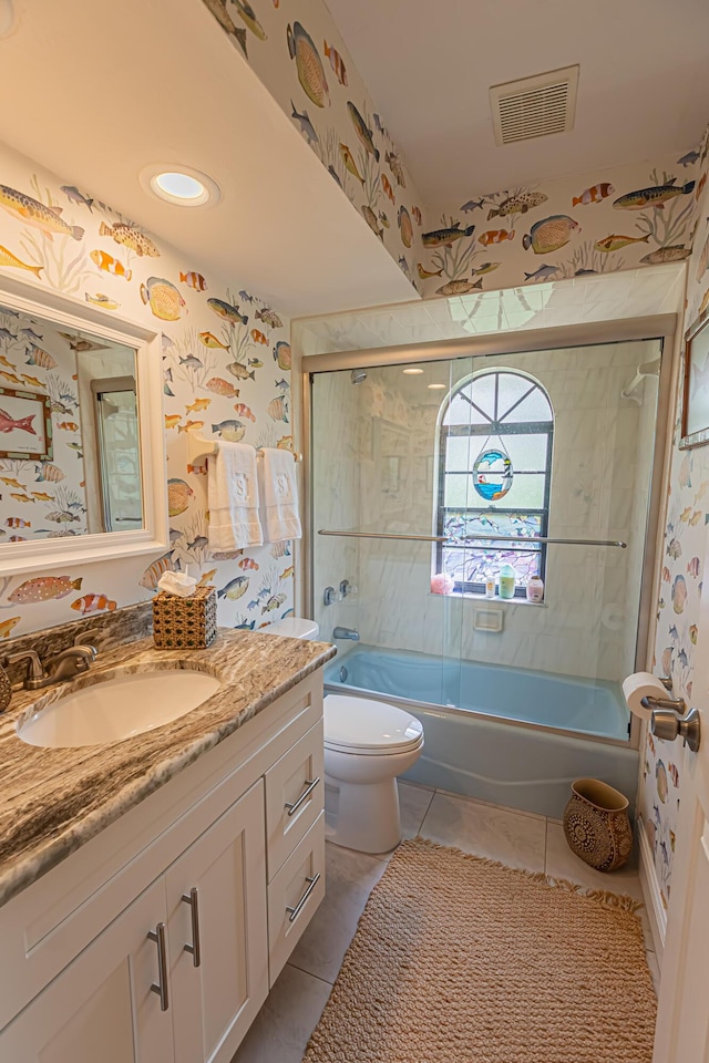 full bath featuring visible vents, toilet, wallpapered walls, tile patterned floors, and combined bath / shower with glass door