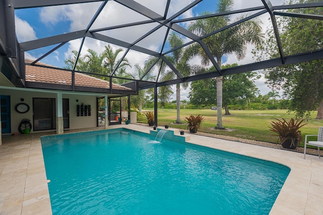 1333 SW Cedar Cv, Port Saint Lucie, FL 34986 - outdoor pool with a patio area, a lawn, and glass enclosure