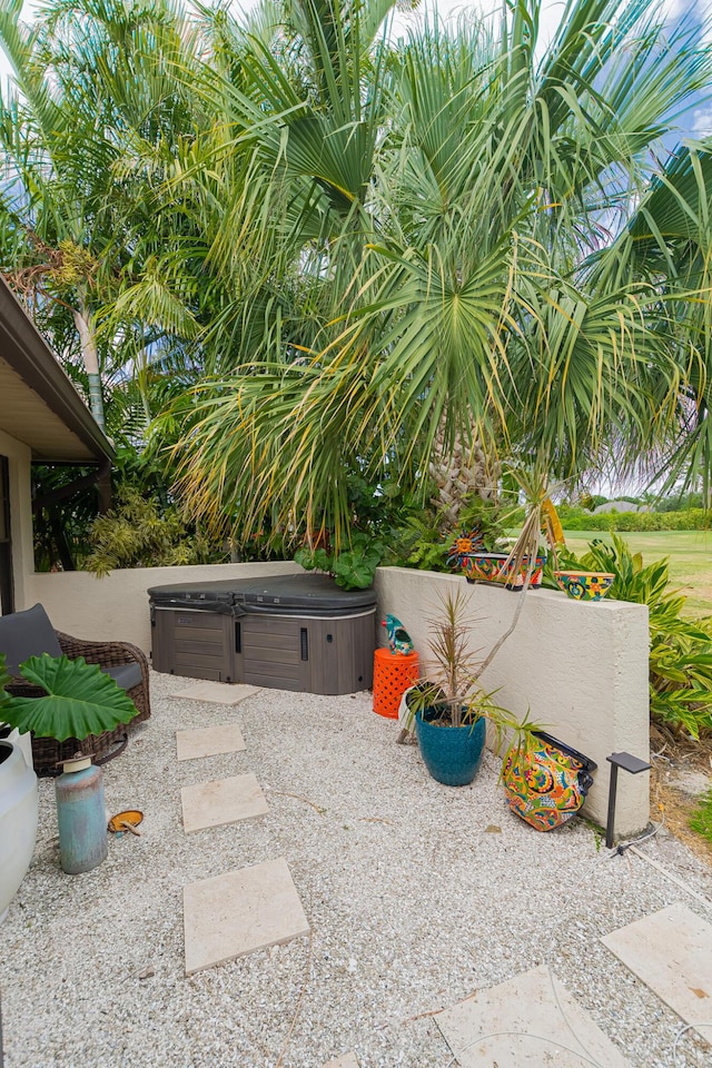 1333 SW Cedar Cv, Port Saint Lucie, FL 34986 - view of patio with a hot tub