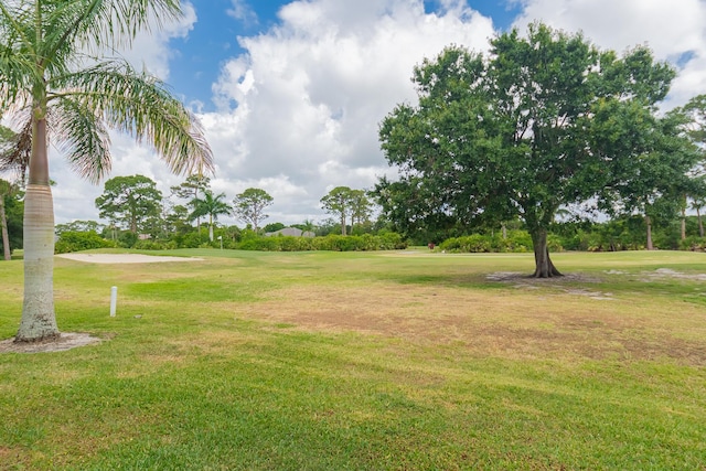 view of yard featuring view of golf course