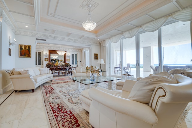 living room with a notable chandelier, ornamental molding, marble finish floor, and plenty of natural light