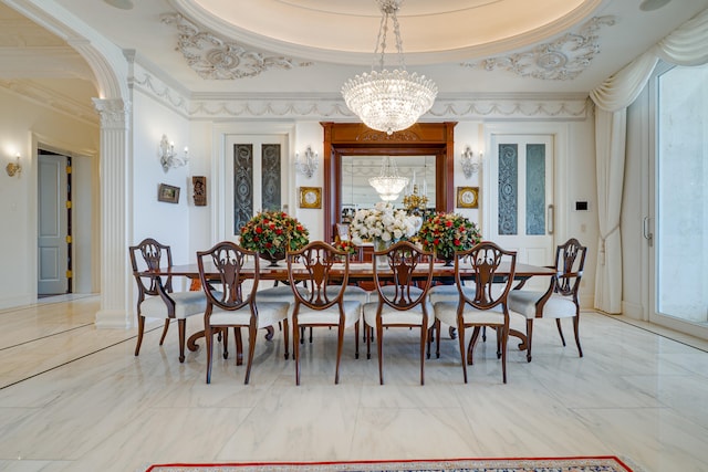 dining room featuring crown molding, marble finish floor, and a chandelier
