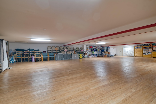misc room with wood finished floors