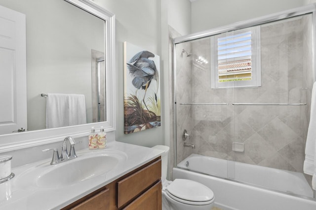 10245 SW Reggiani Rd, Port Saint Lucie, FL 34986 - bathroom with shower / bath combination with glass door, toilet, and vanity