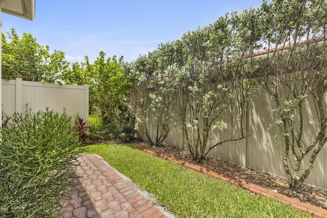 10245 SW Reggiani Rd, Port Saint Lucie, FL 34986 - view of yard featuring a fenced backyard